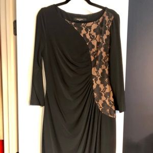 Black cocktail dress with lace insert